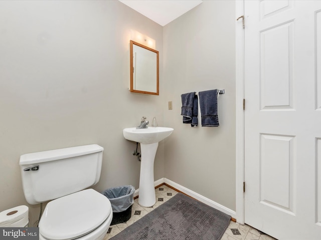 bathroom with sink and toilet