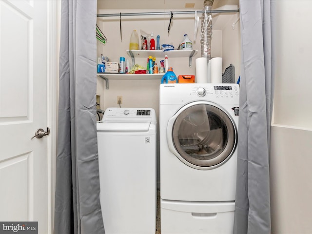 laundry room featuring washer and dryer