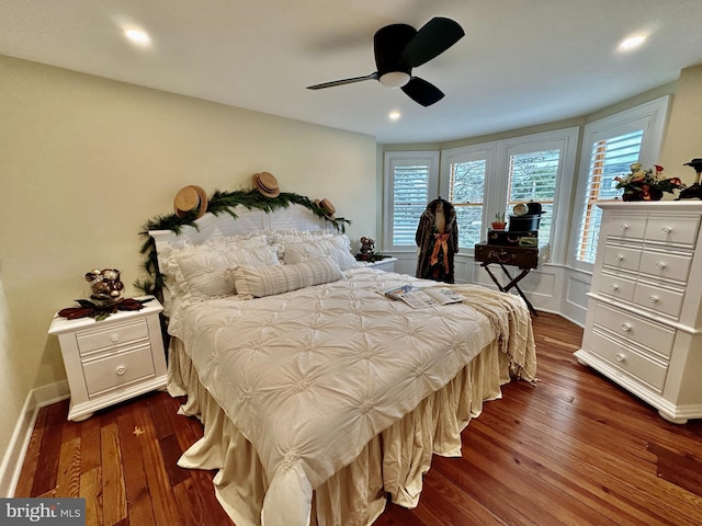 bedroom featuring dark wood-type flooring and ceiling fan