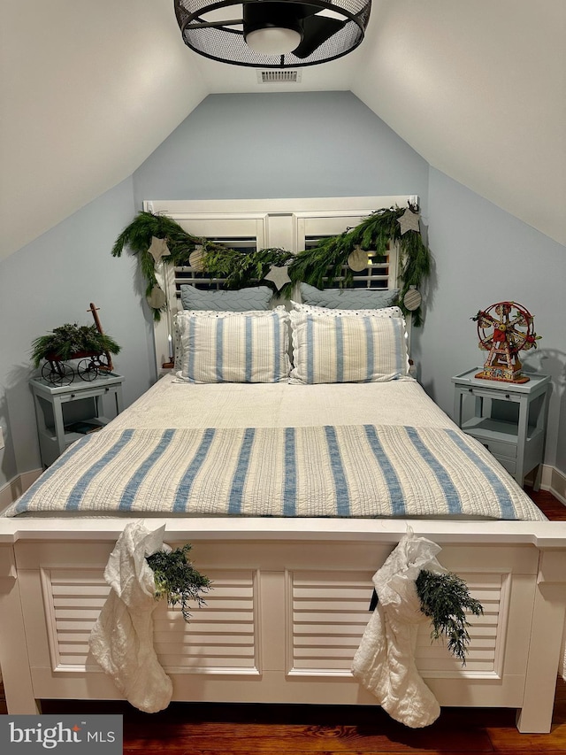 bedroom with vaulted ceiling