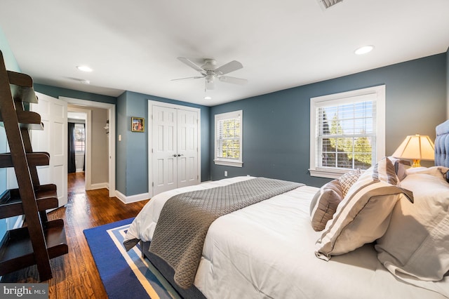 bedroom featuring dark wood-style floors, recessed lighting, a closet, a ceiling fan, and baseboards