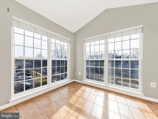 unfurnished sunroom with lofted ceiling