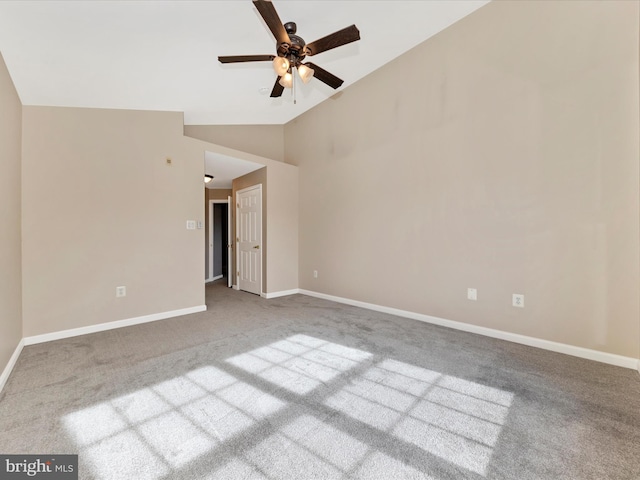 unfurnished room with vaulted ceiling, carpet flooring, and ceiling fan