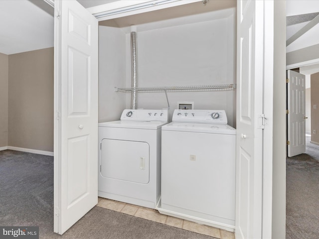 laundry area featuring carpet floors and independent washer and dryer