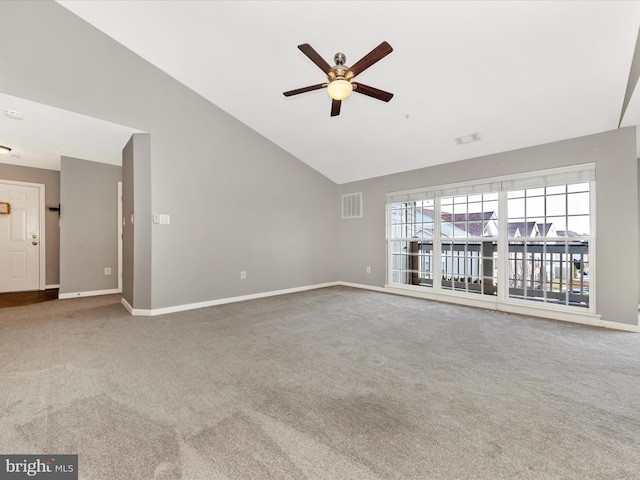 unfurnished living room with ceiling fan, carpet flooring, and high vaulted ceiling