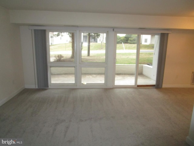 empty room featuring carpet floors