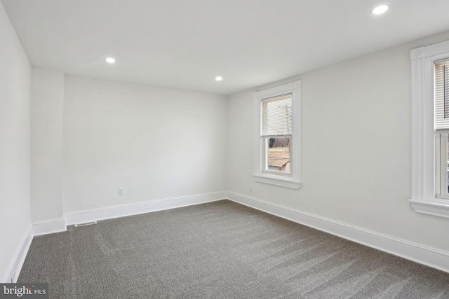 view of carpeted spare room