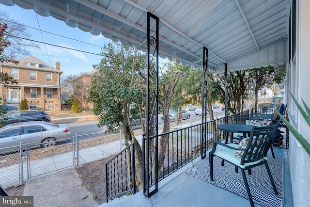 balcony featuring covered porch