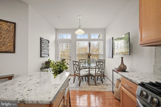 dining room featuring light hardwood / wood-style floors