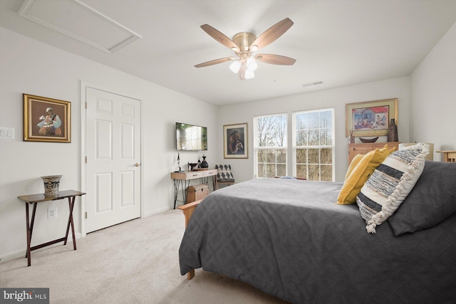 carpeted bedroom with ceiling fan