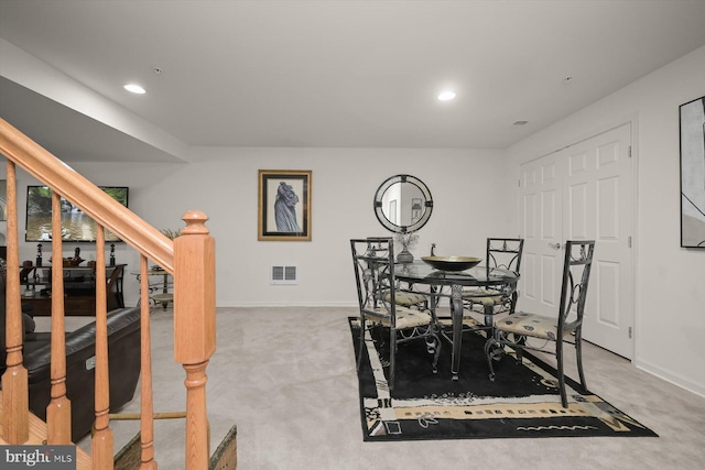 view of carpeted dining space