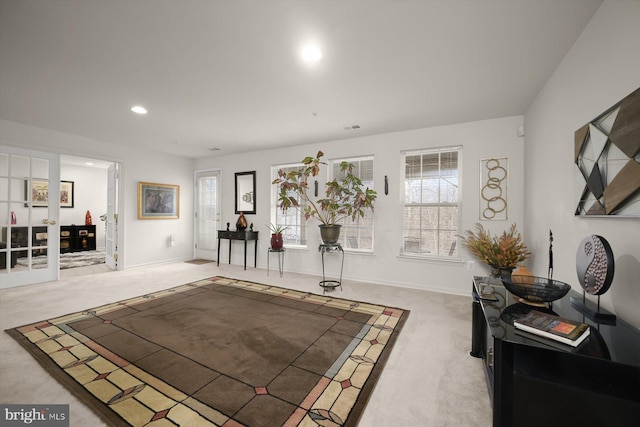 living room with light carpet