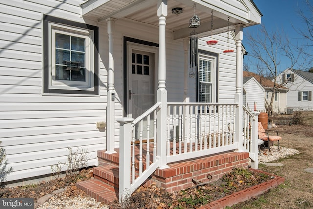 entrance to property with a porch