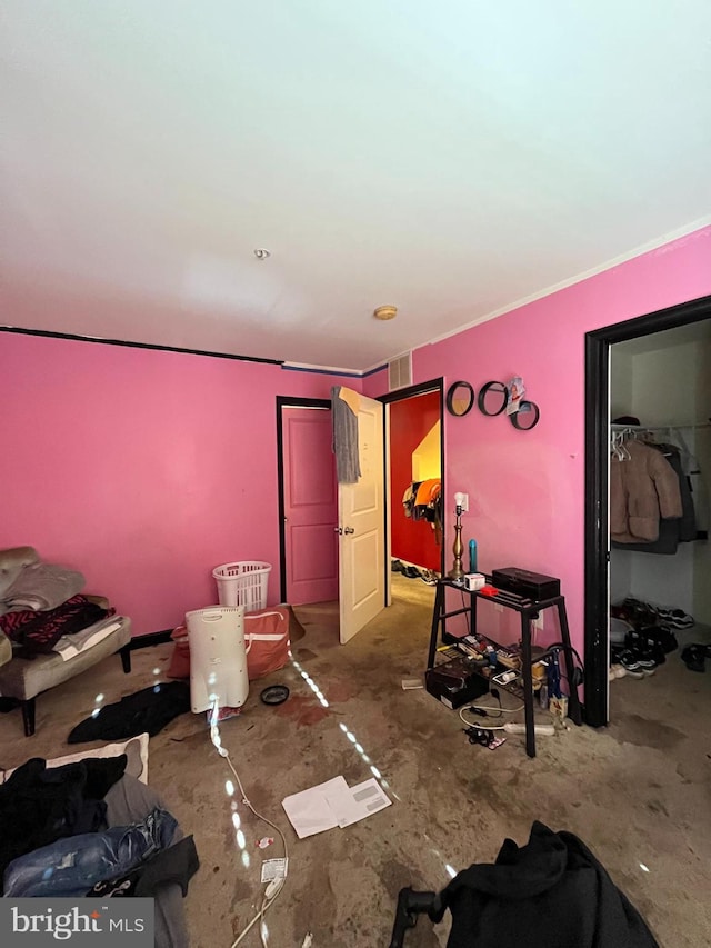 bedroom with concrete flooring