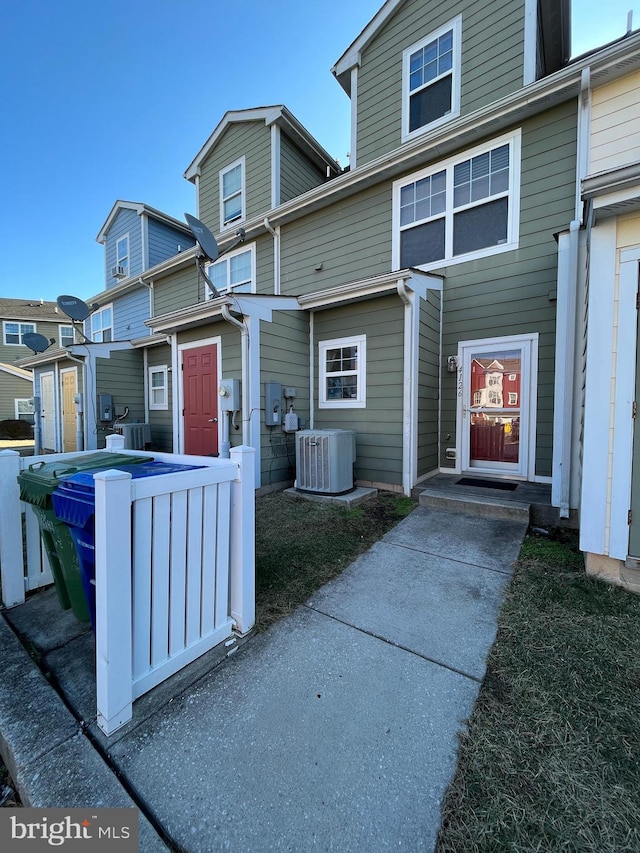 back of property with central air condition unit