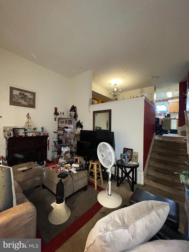 living room featuring a notable chandelier