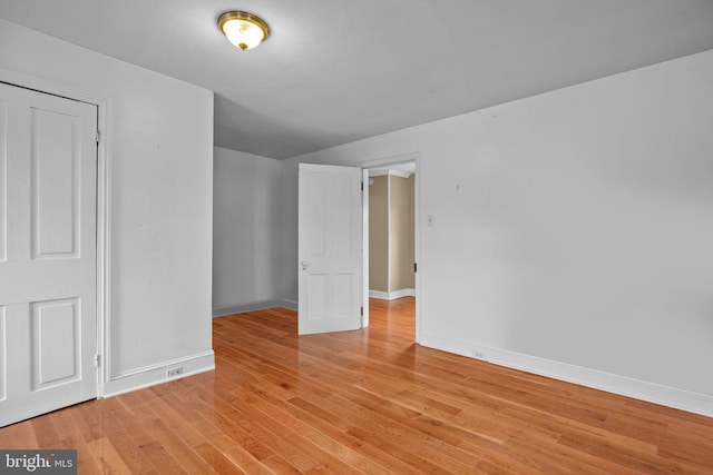 bonus room with light hardwood / wood-style flooring