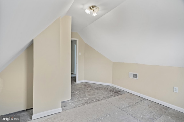 bonus room featuring vaulted ceiling