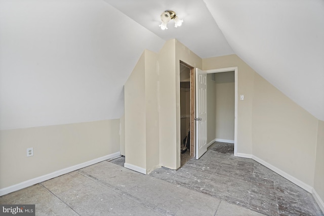 bonus room featuring lofted ceiling