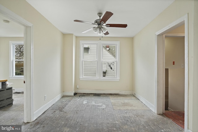 unfurnished room featuring ceiling fan and light hardwood / wood-style flooring