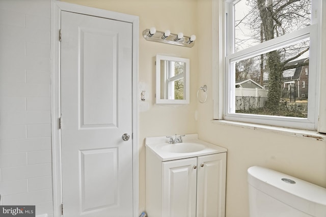 bathroom with vanity and toilet