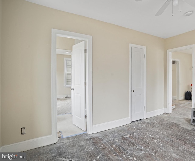 unfurnished bedroom featuring ceiling fan