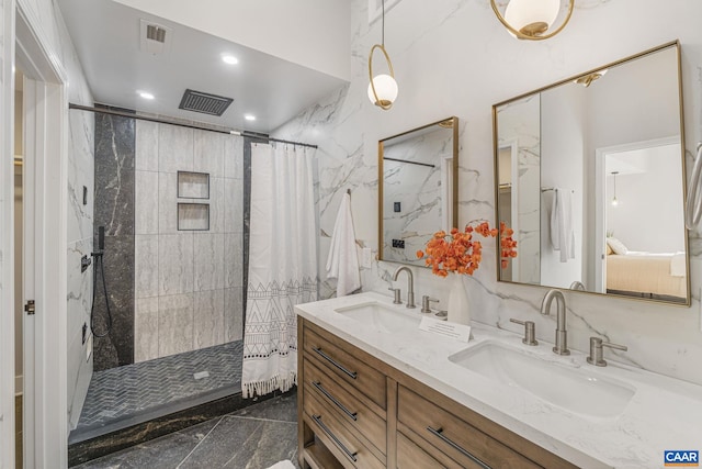 bathroom with vanity and walk in shower