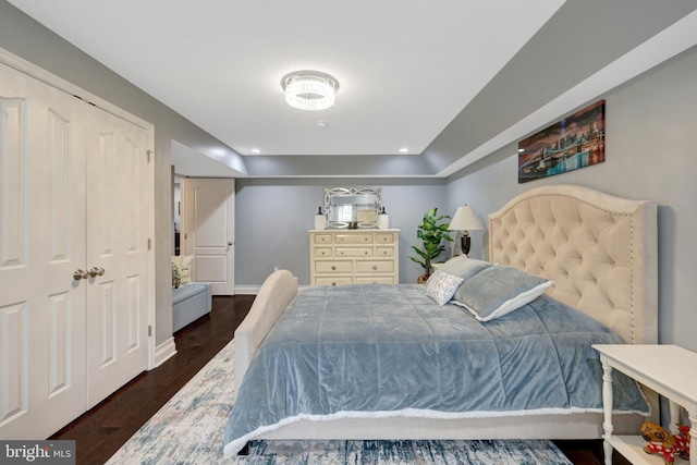 bedroom featuring dark wood-style flooring, recessed lighting, and baseboards