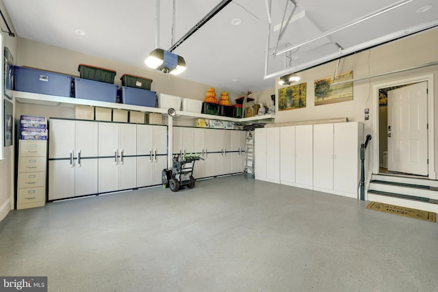 garage featuring a garage door opener