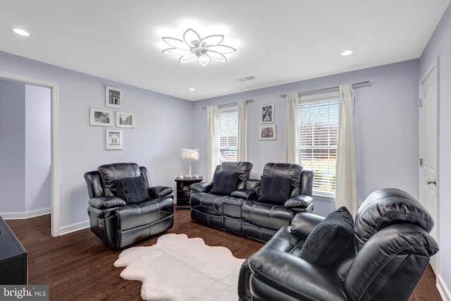 living room with visible vents, baseboards, dark wood finished floors, and recessed lighting