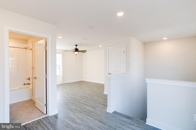 hallway featuring wood-type flooring