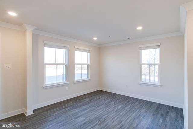 unfurnished room with crown molding and dark hardwood / wood-style floors