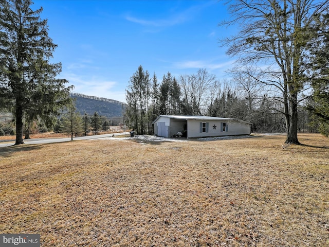 exterior space featuring a mountain view