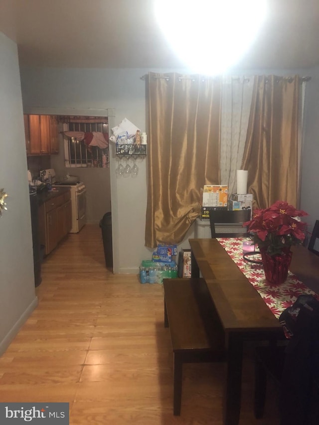 dining room featuring light wood-type flooring