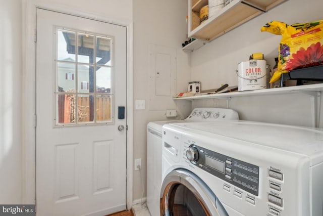 laundry area with separate washer and dryer