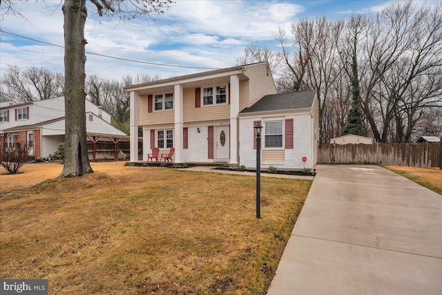 view of front of house with a front lawn