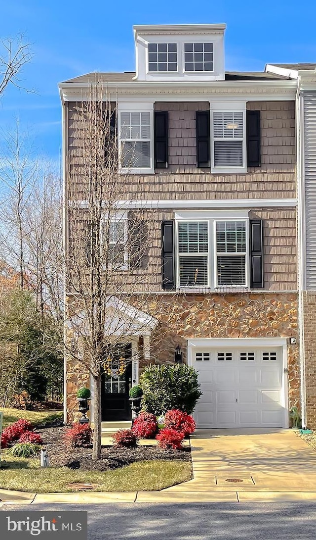 view of front of home with a garage