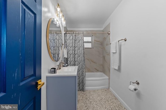 full bathroom featuring speckled floor, shower / bath combo with shower curtain, vanity, and baseboards