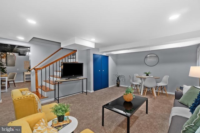 carpeted living room featuring recessed lighting, baseboards, and stairs