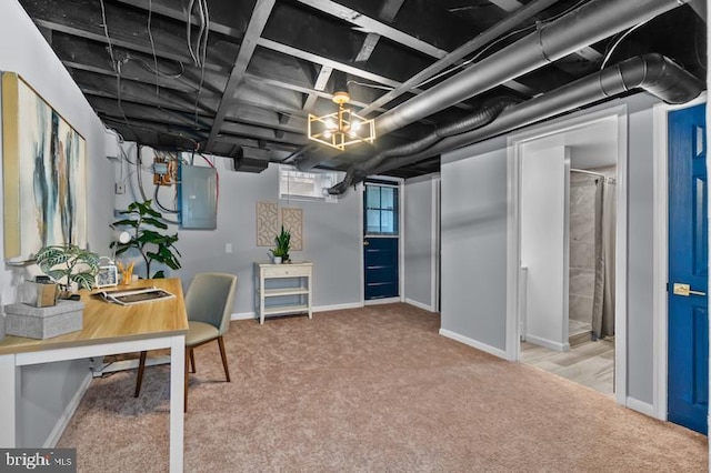 below grade area featuring carpet flooring, electric panel, and baseboards