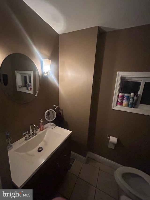 bathroom with vanity and tile patterned floors