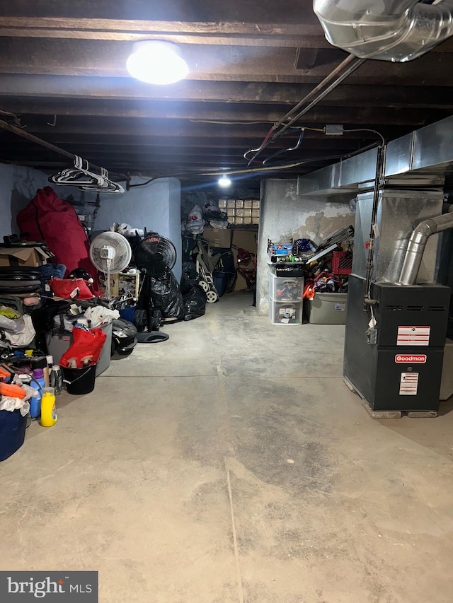 basement featuring heating unit