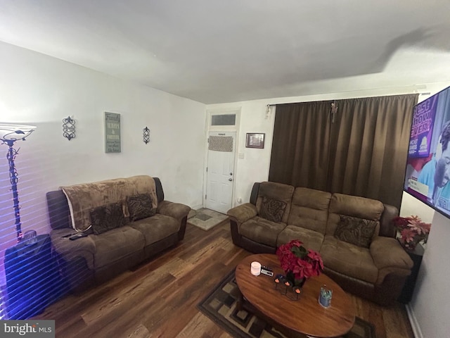 living room with hardwood / wood-style flooring