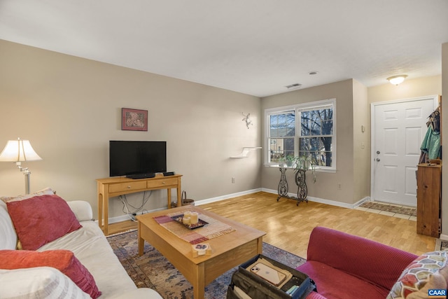 living room with hardwood / wood-style flooring