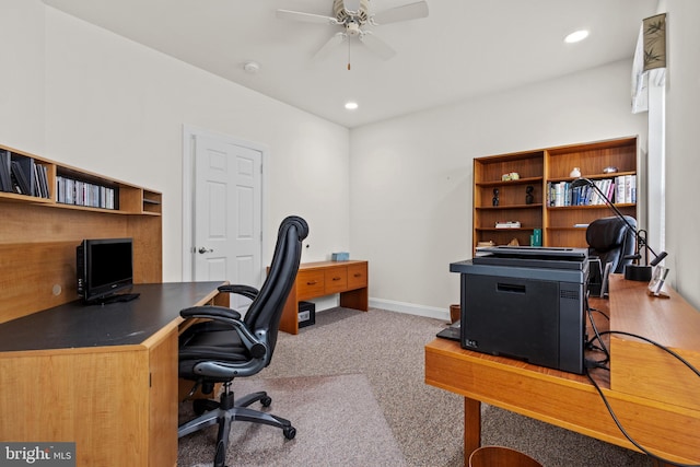 home office with carpet floors and ceiling fan