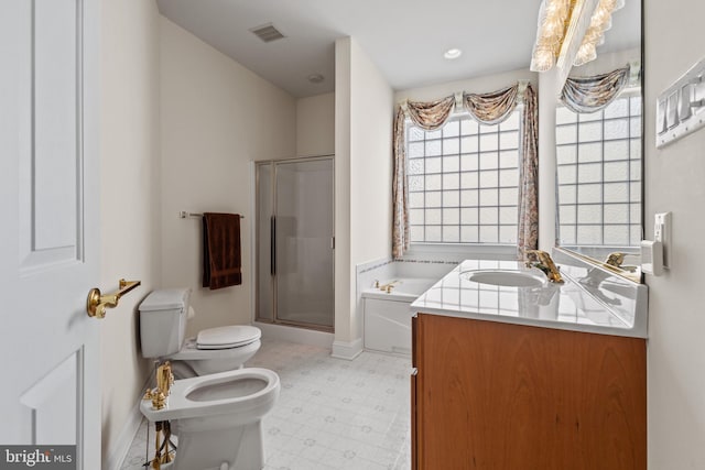 full bathroom featuring a bidet, vanity, toilet, and shower with separate bathtub