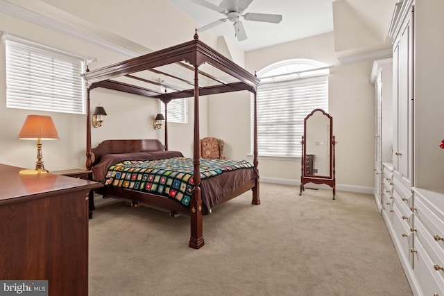 bedroom with light carpet and ceiling fan