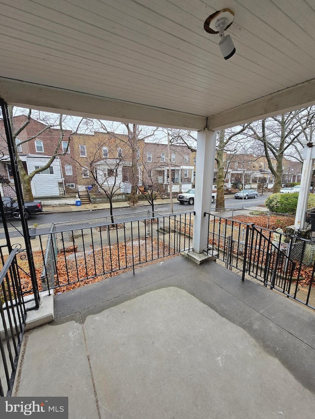 view of patio / terrace featuring ceiling fan and a porch