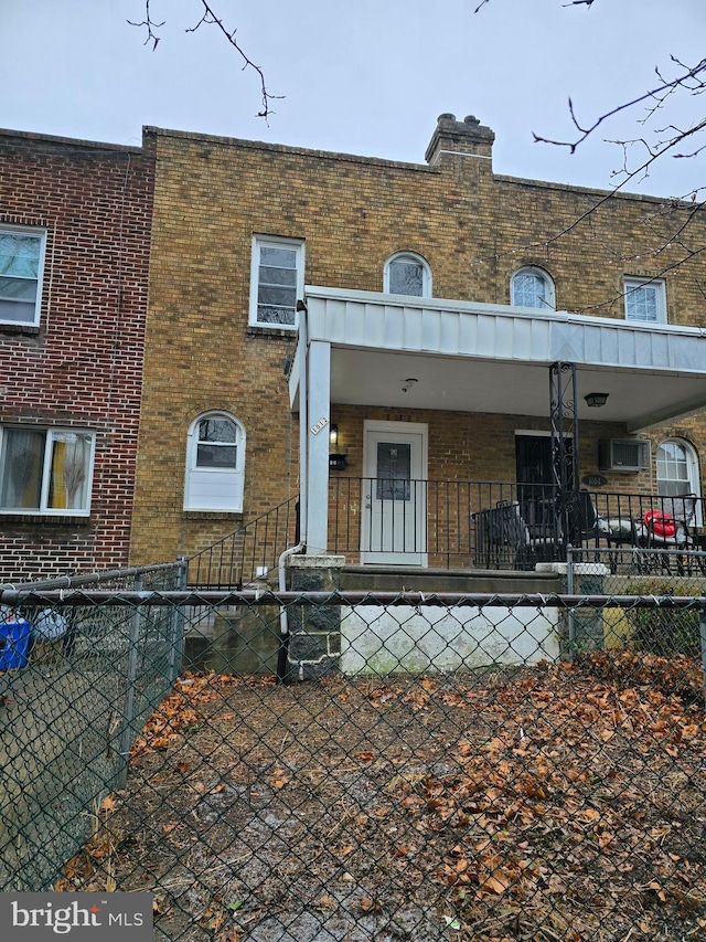 back of house with a porch