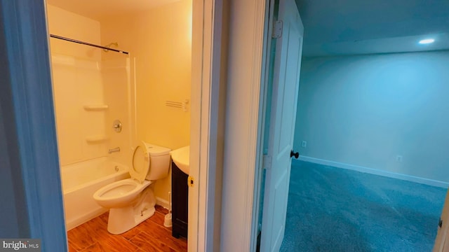 full bathroom with vanity, toilet, bathing tub / shower combination, and wood-type flooring